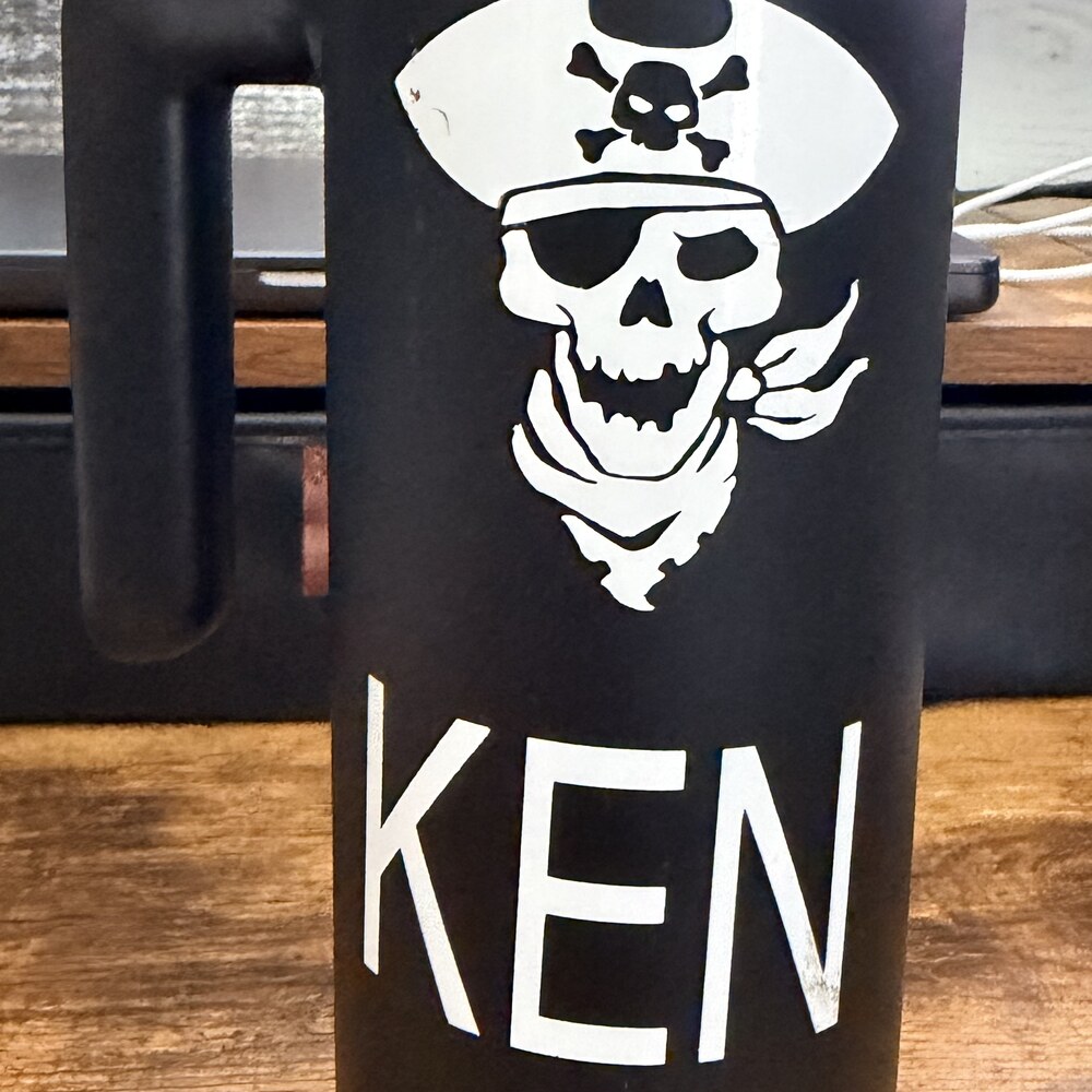 Custom engraved 30oz travel tumbler, personalized with a name and design